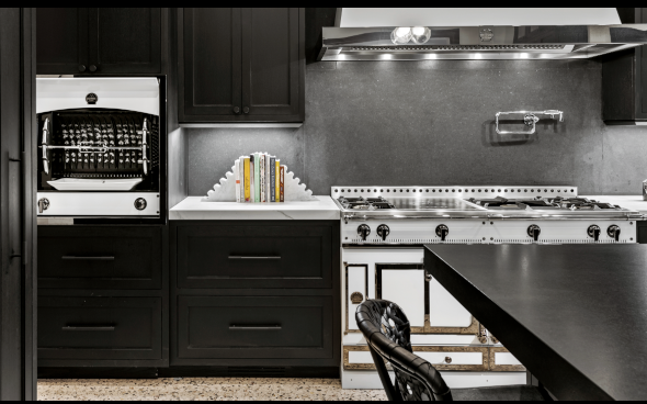 Dramatic kitchen design with a custom white oven and stove range