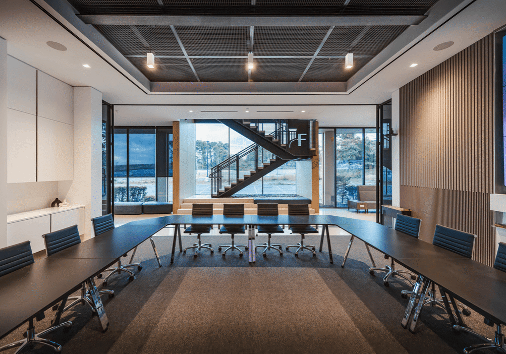 Large conference room that was re-imagined by Mojo Stumer Associates